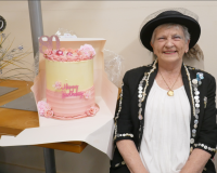 “Pearly Queen” Rosemary at the start of the evening, beside her lovely 80th birthday cake.