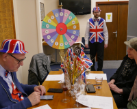 Chris, ready to “spin that wheel”, for the “Horse Racing” that's about to start. Pete's studying form already!